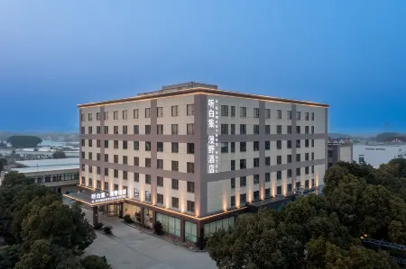 A.OSMANTHUS HOTEL Отели рядом с достопримечательностью «Shanghai Industry and Commerce Foreign Language College South Campus»