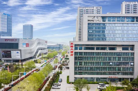 Qingdao Xinlong Grand Hotel (Jinshatan) Отели рядом с достопримечательностью «Jiaonan Jimiya Fishing Port»