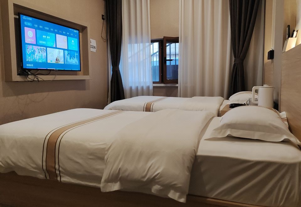 Xinjihao Hotel - Housity