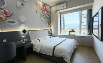 Xichang Aiboman Light Luxury Hotel (Qionghai 17 Degree Shop)