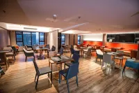 โรงแรมอีชาร์ม (ตงจ้าน หวู่เย่ กวงชาง เซี่ยวกาน)