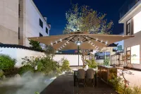 婺源阡陌居·花園藝術空間設計師民宿 婺女洲度假區-五顯堂附近的飯店