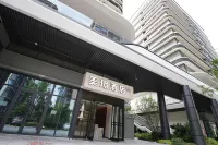 Yibin Meijing Hotel (Yibin Railway Area)