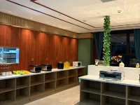 Qira Yuehua Grand Hotel 처러 호텔
