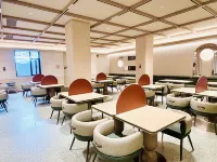 Orange Hotel (Hami Jianguo North Road Huijia Times Hami Shopping Center) - servizio colazione