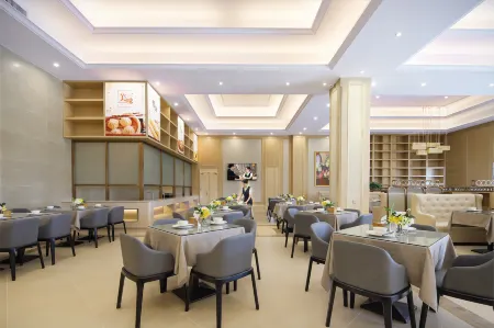 Vienna International Hotel (Yuhuan Wanda Plaza) Отели в г. Юйхуань