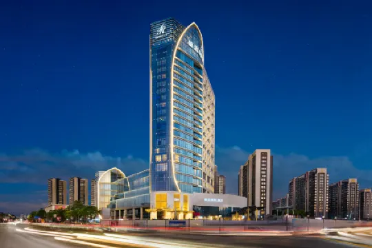 DeRUCCI Hotel (DongGuan BinJiang Stadium Station) Отели в г. Дунгуань