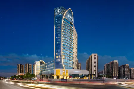 DeRUCCI Hotel (DongGuan BinJiang Stadium Station) Отели рядом с достопримечательностью «CPC Dongguan Party School of CPC»