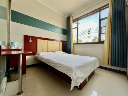 Zhoukou Kaixinyuan Hotel (Baicheng Railway Station)