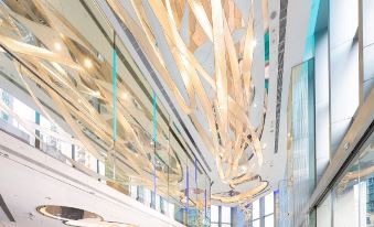 The lobby and entrance of a large building have been decorated in an atrium at iclub Mong Kok Hotel