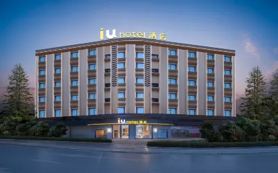 IU Hotel (Xishuangbanna Jinghong Gaozhuang Xishuangjing Branch) Hoteller i 