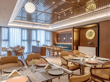 Orange Hotel (Nanjing Zhongyangmen Jianning Road) Отели рядом с достопримечательностью «Jinling Institute of Technology Xiaozhuang Campus»