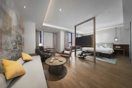 Manju Hotel (Zhuji Wanfeng Xintiandi Yongli Plaza) Отели рядом с достопримечательностью «Zhuji Gymnasium»