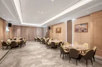 Vienna Hotel - Desayuno