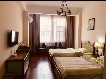 Luoping Huaying Image Theme Inn Отели в г. Луопинсянь