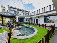 Qixu Homestay (Tianjin Jiushan Cheshenjia Store)