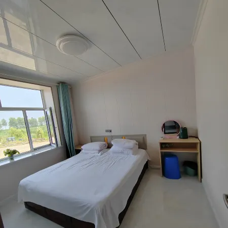 Jiayin Fisherman's House Travel Hotel