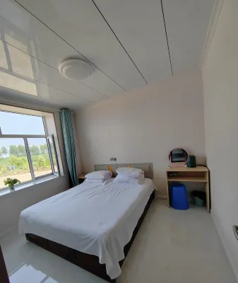 Jiayin Fisherman's House Travel Hotel