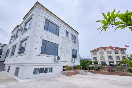 Dongxing Haihu Lvjingyuan Homestay Отели рядом с достопримечательностью «Wanwei Golden Beach»