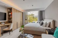 Suzhou New District Science and Technology City CM+ Serviced Apartment Отели рядом с достопримечательностью «Shushan Ecological Garden Passenger Transport Terminal»