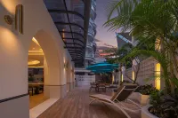 Aitingbao Hot Spring Hotel (Xishuangbanna jinghongGaozhuang Xishuangjing Xingguang Night Market) - 4-Sterne