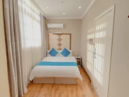 Yijing Business Hotel (Xiaogan Railway Station) Отели рядом с достопримечательностью «Hubei Engineering University»