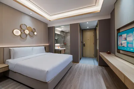 Orange Nantong Railway Station Vientiane City Hotel Отели рядом с достопримечательностью «Beishi Scenic Area»