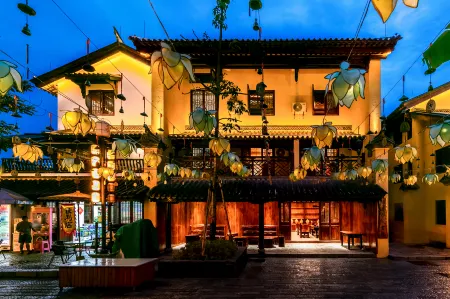 Penglai Heyuan Inn (Pu'er Tea Town Branch) Отели в г. Пуэр