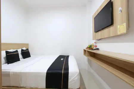 Capital O 93266 Palmier Hotel