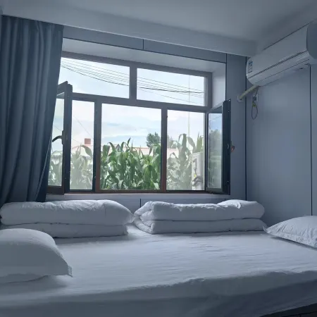 Fuyuan Zhejie Sister Homestay (Nangang Hezhe Ethnic Village)