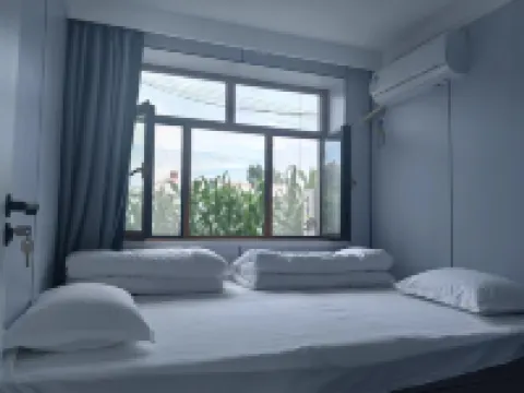 Fuyuan Zhejie Sister Homestay (Nangang Hezhe Ethnic Village)