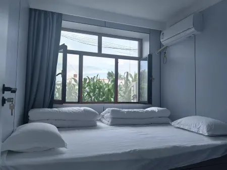 Fuyuan Zhejie Sister Homestay (Nangang Hezhe Ethnic Village)