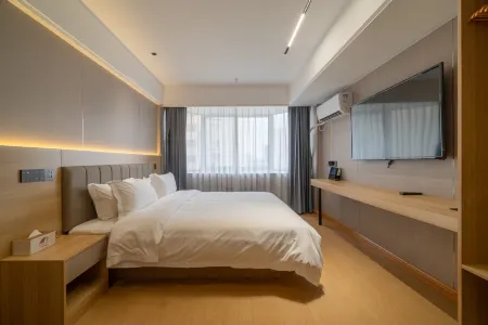 Qiuwang Hotel (Shanghai Caobao Road Subway Station Branch) Отели рядом с достопримечательностью «Longhua Temple»