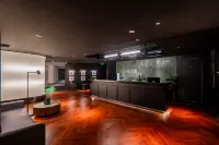 WondIsland Mandao Hotel (Leshan Zhanggongqiao Food Street Branch) - bar