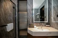 Xinyi Hotel (Neijiang High-Speed Railway North Station Normal College)