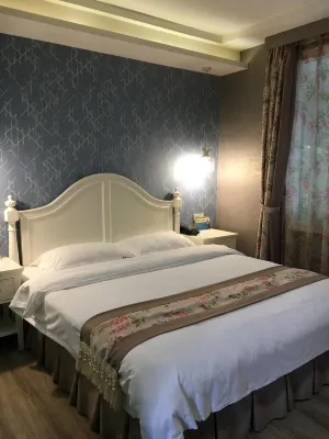 Old Four Seasons Wind Hotel Hotel in zona Honghe Gymnasium