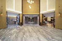 Yasfeir Hotel (Wuzhou South High-speed Railway Station, Canghai Lake, Fozidian Branch) - parking