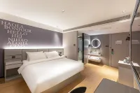 โรงแรม Ni Hao (สถานีขนส่ง ฉี่ตง) - ที่มีที่จอดรถ