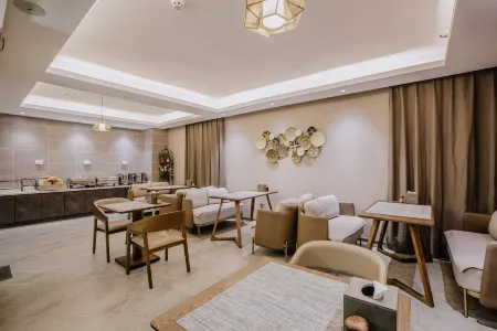 Ruoman Hotel (Taiyuan Jinyang Lake Convention and Exhibition Center Vientiane City) Отели рядом с достопримечательностью «Taiyuan University of Science and Technology (South Area)»