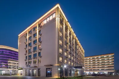 Orange Hotel (Kunshan Zhangpu Yindu Commercial Plaza store) Отели рядом с достопримечательностью «Магазины Ван Кинглун»