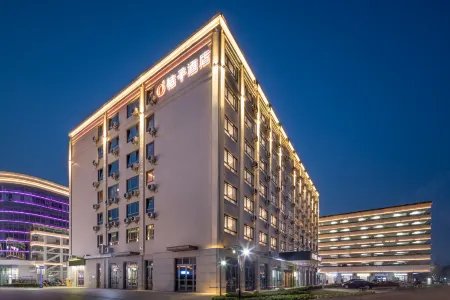 Orange Hotel (Kunshan Zhangpu Yindu Commercial Plaza store) Отели рядом с достопримечательностью «Qiandeng Ancient Town»