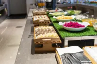 Manju Hotel (Zhuji Wanfeng Xintiandi Yongli Plaza) - servizio colazione