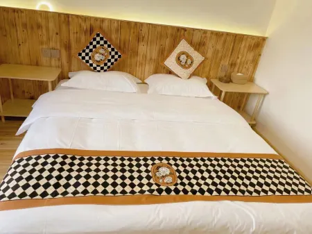 Youyijia Roasted Whole Lamb Homestay Отели рядом с достопримечательностью «Bamian Mountain»