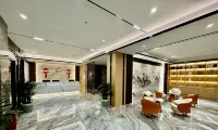 Xifu Holiday Hotel (Hechi City Nandan County Bus Terminal) فنادق في ناندان