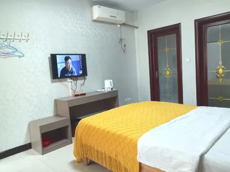 Xingyang Xinyuan Homestay Отели рядом с достопримечательностью «Xingyang People's Park»