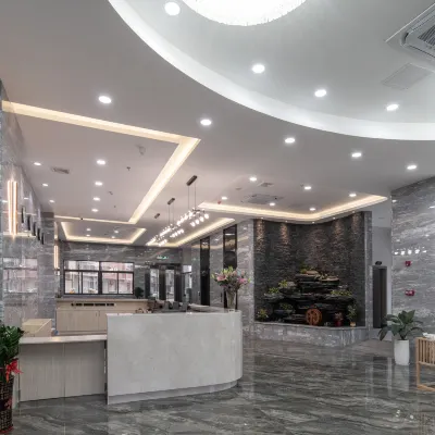 Xinying Hotel (Mingzhu Station) Hotels near Meixi Memorial Arch