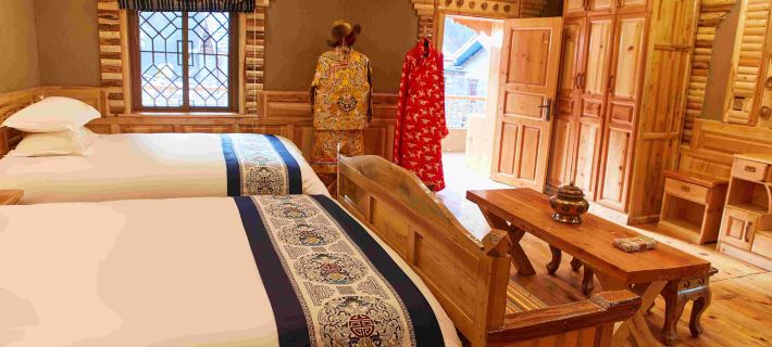 Yangrong Hade Boutique Hostel Hotele w: Powiat Heishui