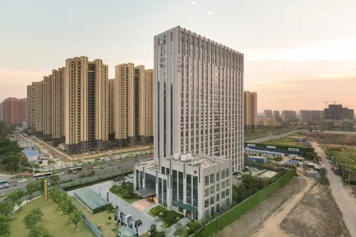 Ji Hotel(Yangzhou Yizheng Baoneng Plaze ) - parking