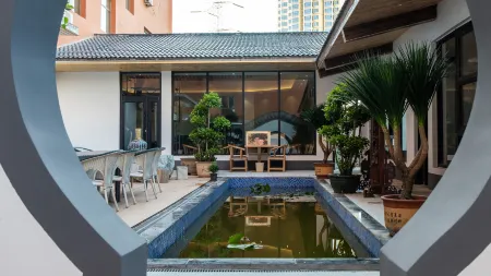 Eaton Shangpin Hotel (Bowen Institute of Technology) Отели рядом с достопримечательностью «Lanzhou Resources & Environment Voc-Tech College»