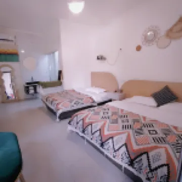 特克斯奶嘴象民宿（盛世華疆八卦城之夜店）